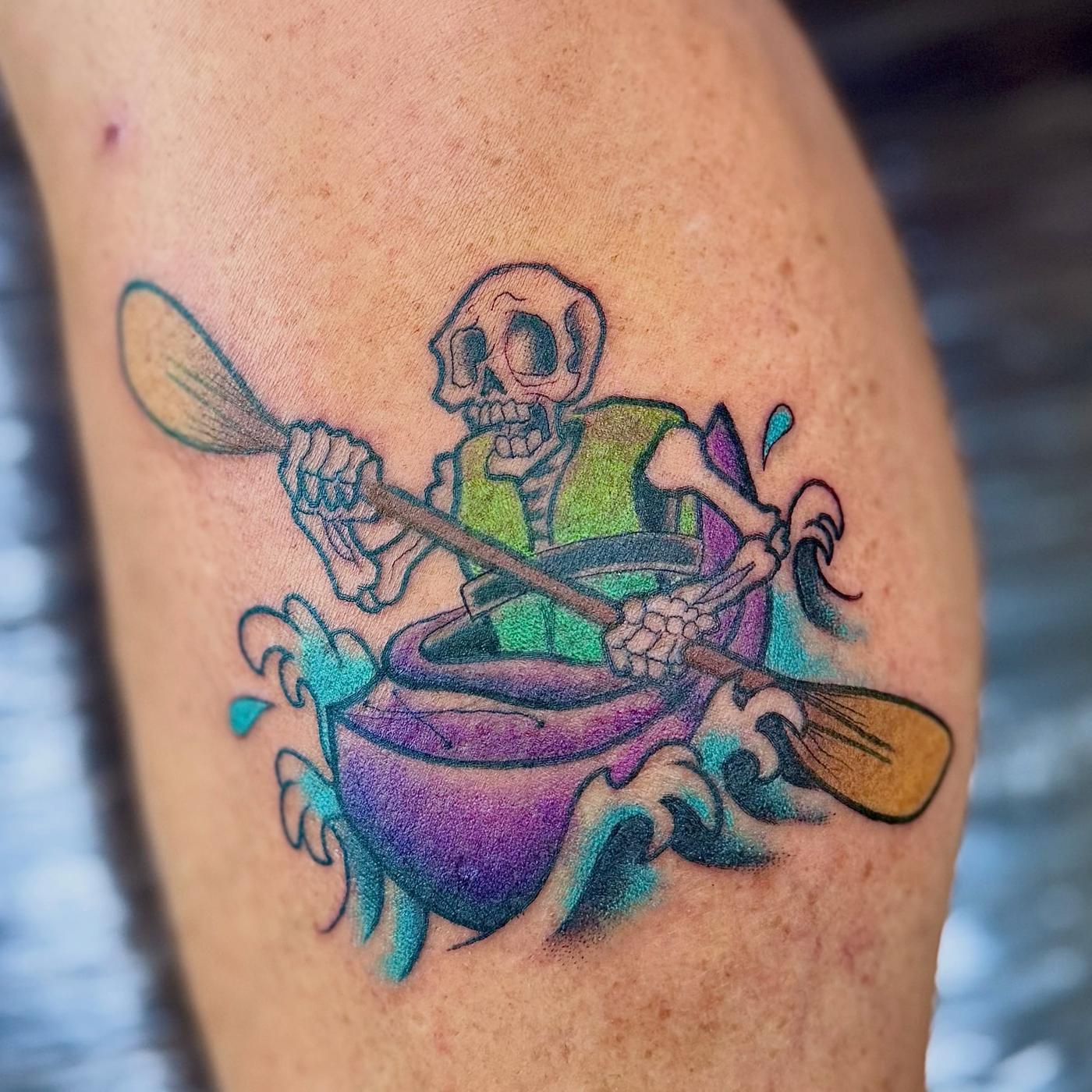 Colour skeleton paddling a kayak through waves, on a calf.